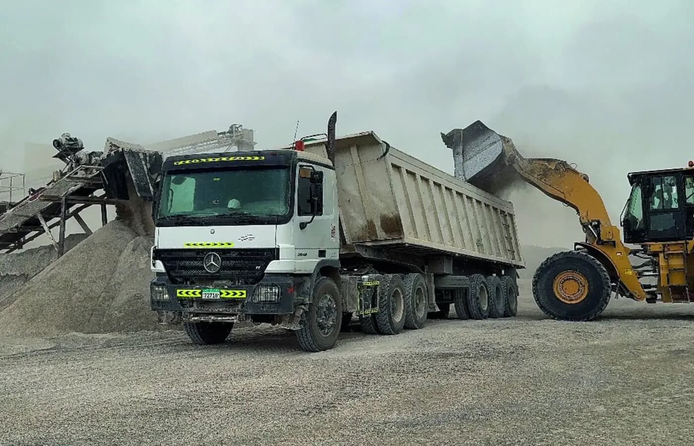 Limestone delivery truck being loaded at the quarry